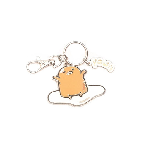 SANRIO LLAVERO YAWN GUDETAMA - AMARILLO